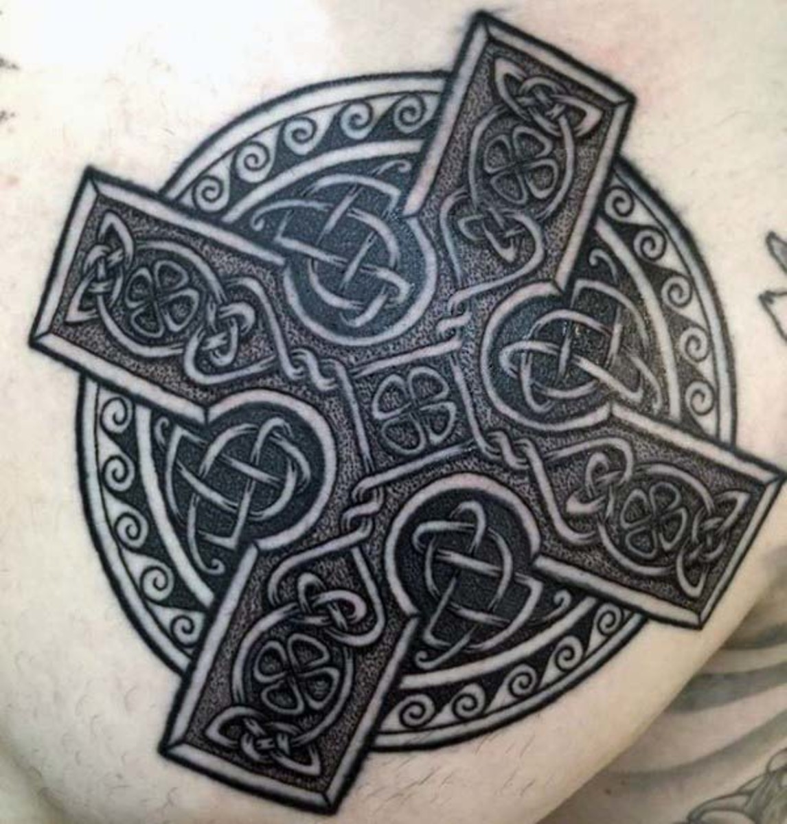 celtic-guys-upper-chest-dotwork-irish-tattoo-ideas