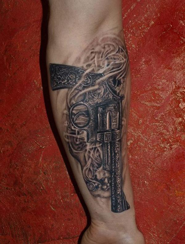 Gun Underarm Tattoo