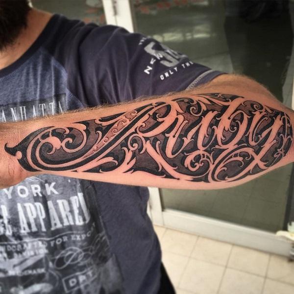 Vanvittig script lettering tatovering