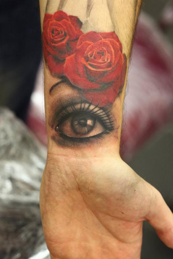 Eye and Rose Underarm Tattoo