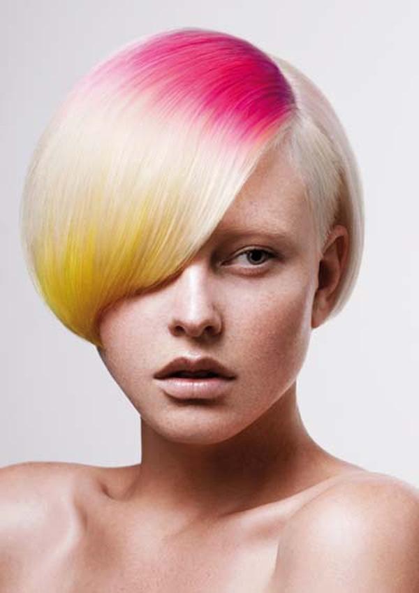 Ombre vaaleanpunaiset ja keltaiset värjätyt hiukset