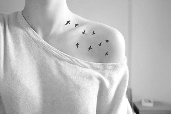 fugle kravebenet tatovering