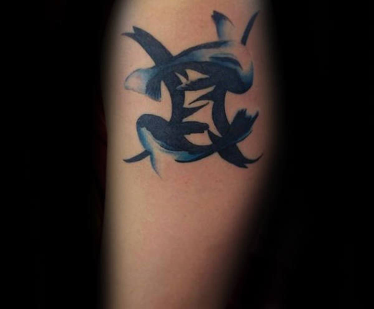kreativ-fiskene-han-arm-tatovering-inspiration