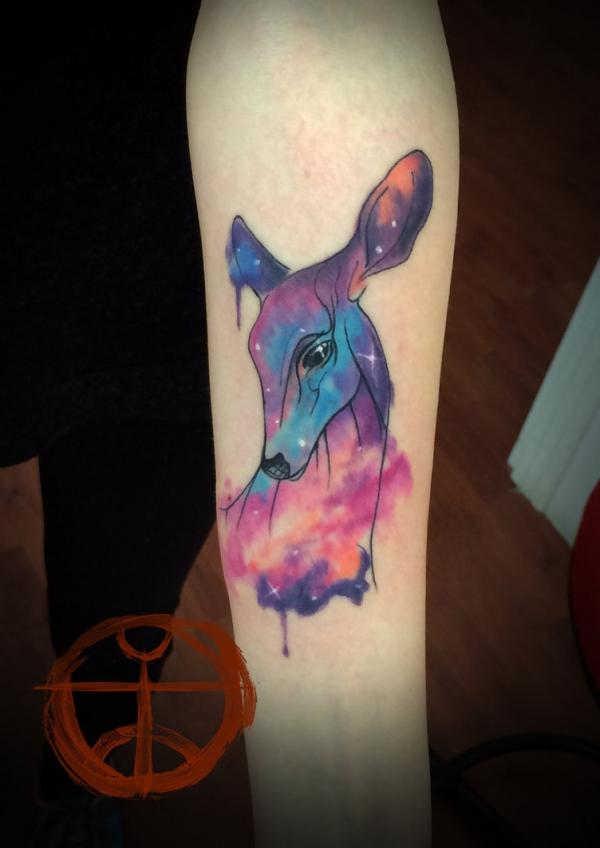 Galaxy Unicorn tatuointi kyynärvarressa