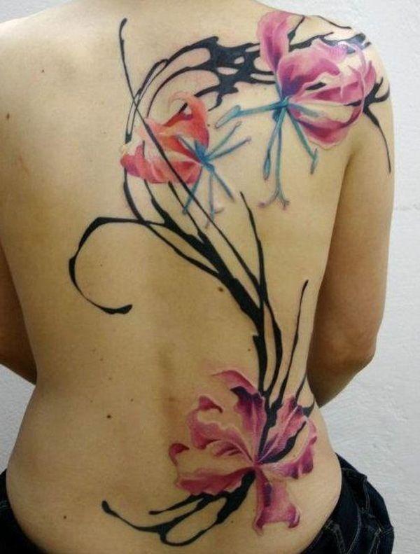 Elegant magnolia akvarel tatovering på fuld ryg til kvinde