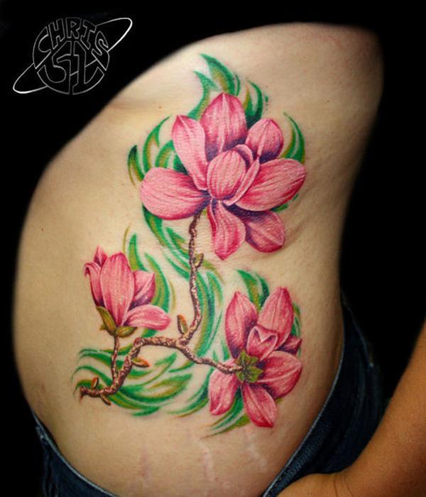 Vaaleanpunainen magnolia kukka tatuointi