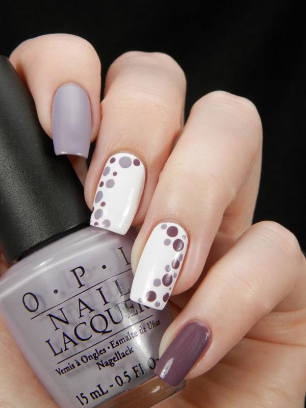 Olive har aldrig set så elegant ud i dette matte og polka dot -inspirerede nail art -design