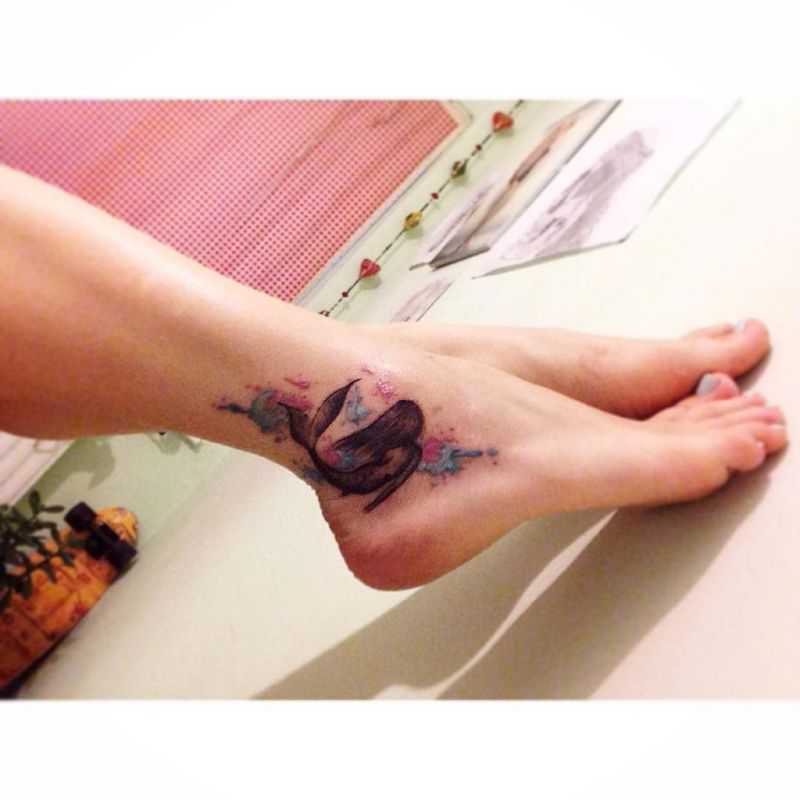 75 maagista merenneito -tatuointia