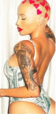 Amber RoseDet kræver en særlig slags dame at få en tatovering af hendes mands portræt omgivet af marihuana blade påtrykt på hendes arm, og den dame er den berygtede Amber Rose, der permanent markerede sig med Wiz Khalifas portræt tilbage i maj 2013. Selve tatoveringen var temmelig fagligt udført, men der er ingen tvivl om, at Amber endte med at fortryde blækket, da hun og Wiz indgav skilsmisse i slutningen af ​​2014. Selvom Rose og Khalifa har et barn sammen - en lille dreng ved navn Sebastian - og derfor er forbundet for livet, vi ville ikke blive overraskede, hvis modellen besluttede at skjule sin Wiz Khalifa portræt -tatovering på et tidspunkt i den nærmeste fremtid.