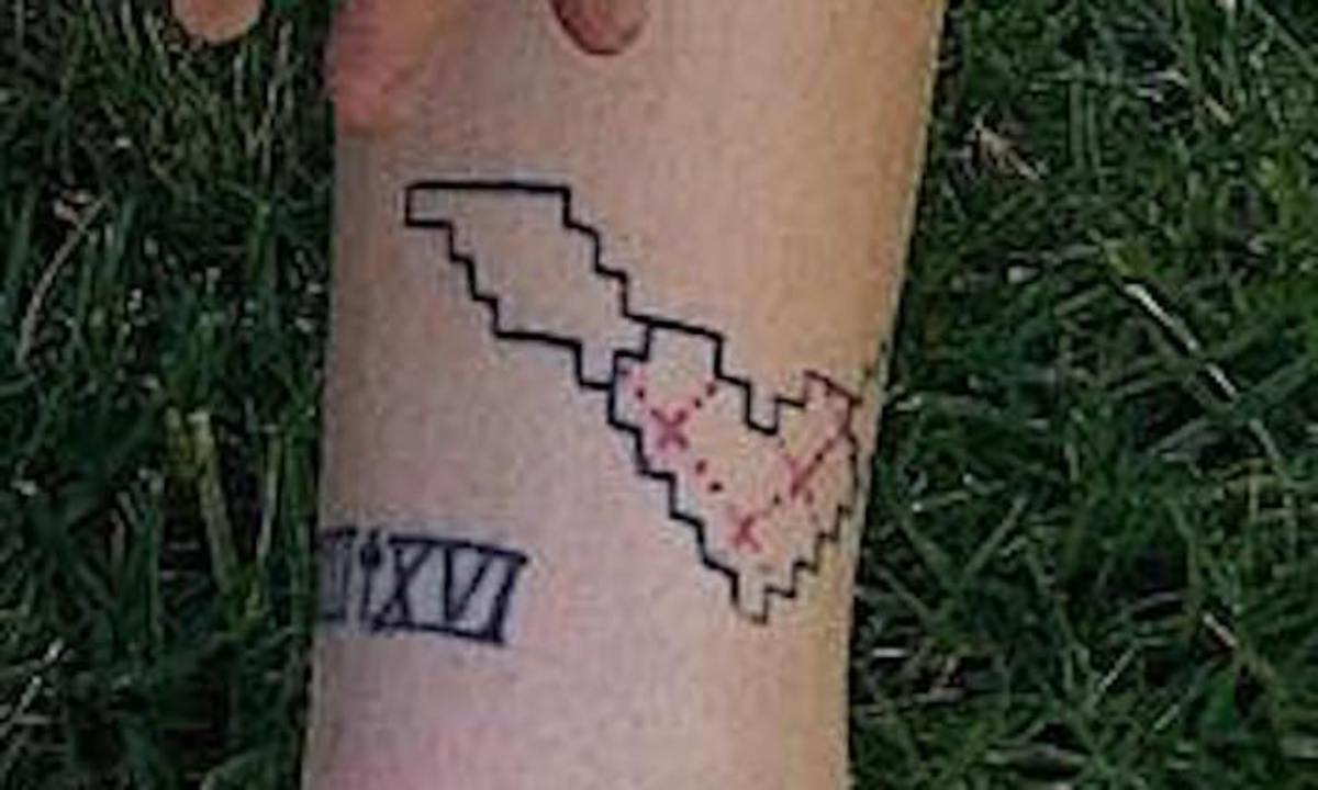 ethan-dolan-heart-ankle-tattoo