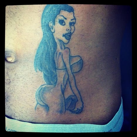 Kim Kardashianin fani -tatuointi